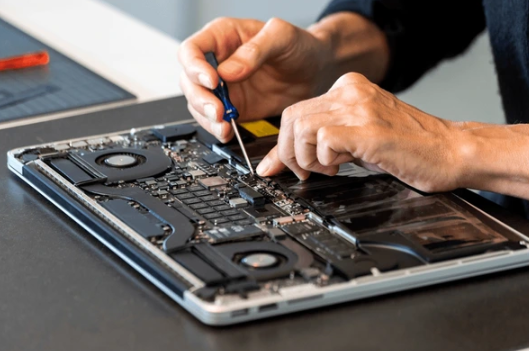 Technician providing secure remote computer repair services for PC users in California